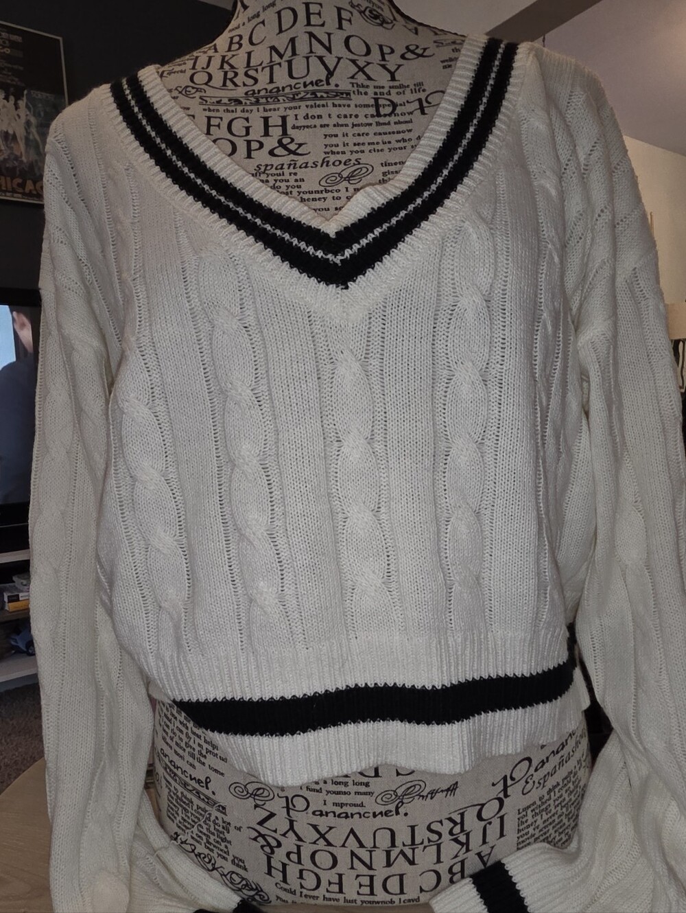 Cream Cable Knit V-Neck Sweater with Black Trim